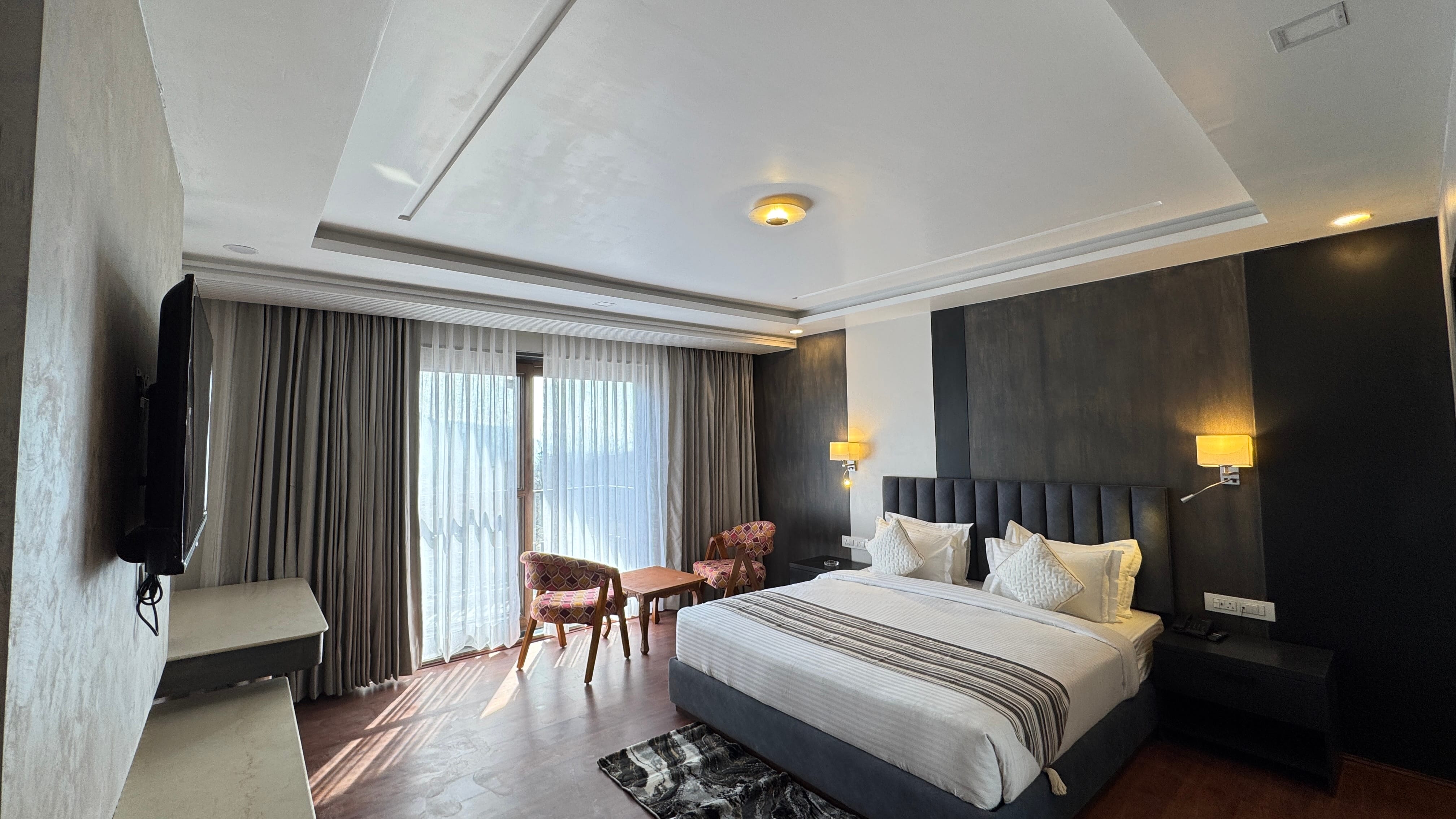 Double Deluxe Premium room with mountain view balcony at Emroz by Kings Resort