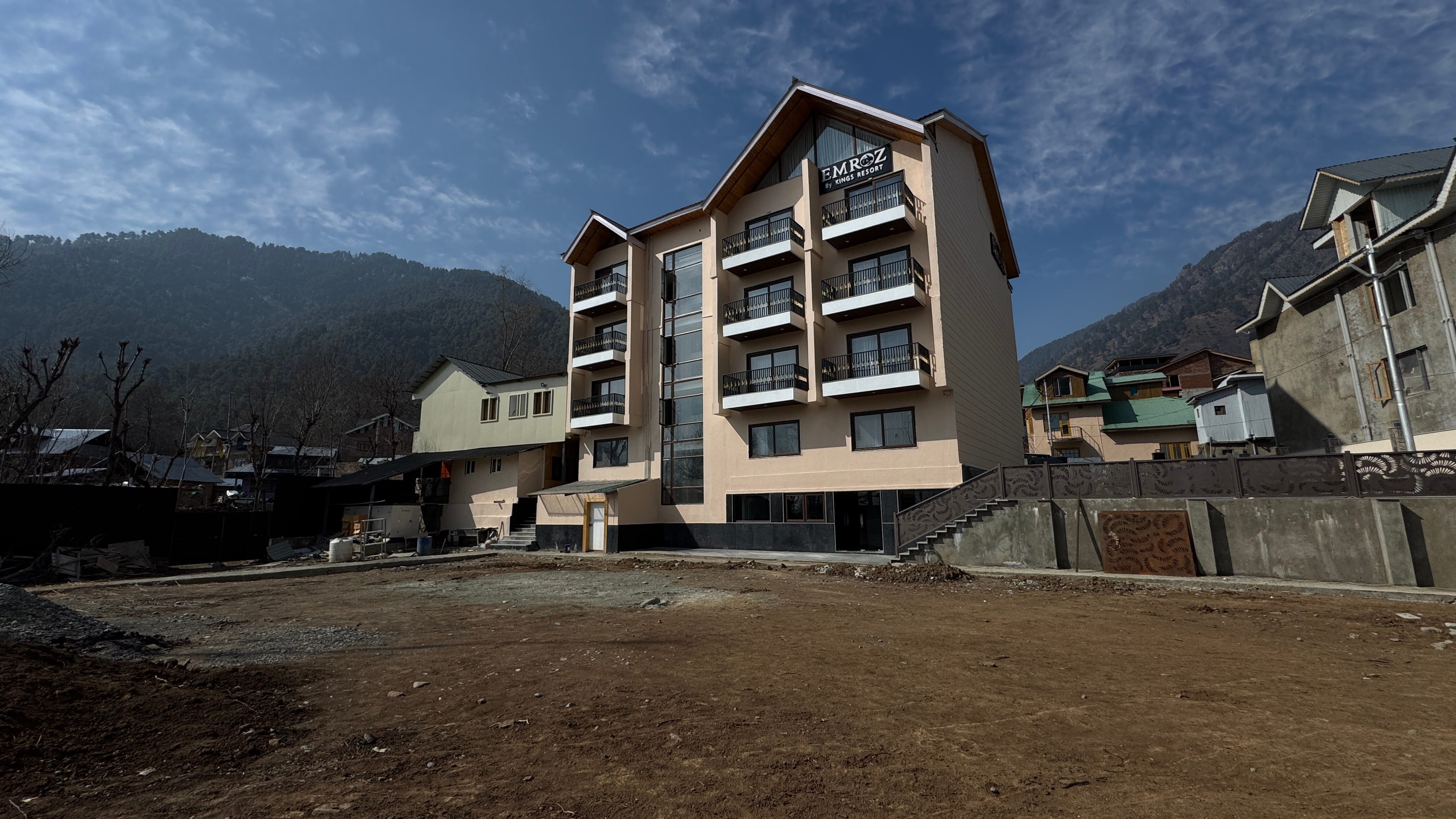 Emroz by Kings Resort exterior with surrounding Pahalgam village and mountain landscape