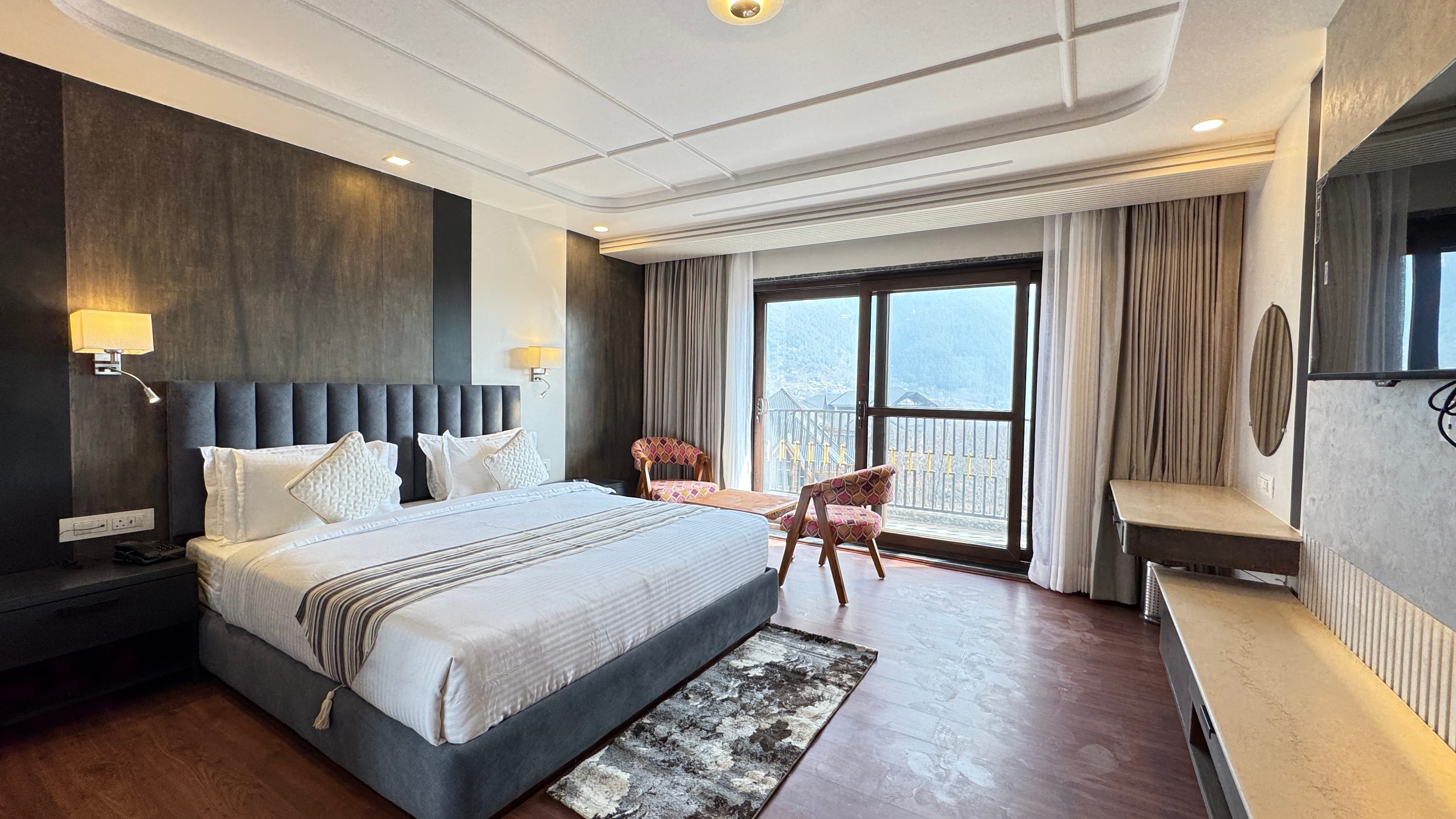 Premium room with mountain view balcony and elegant furnishings