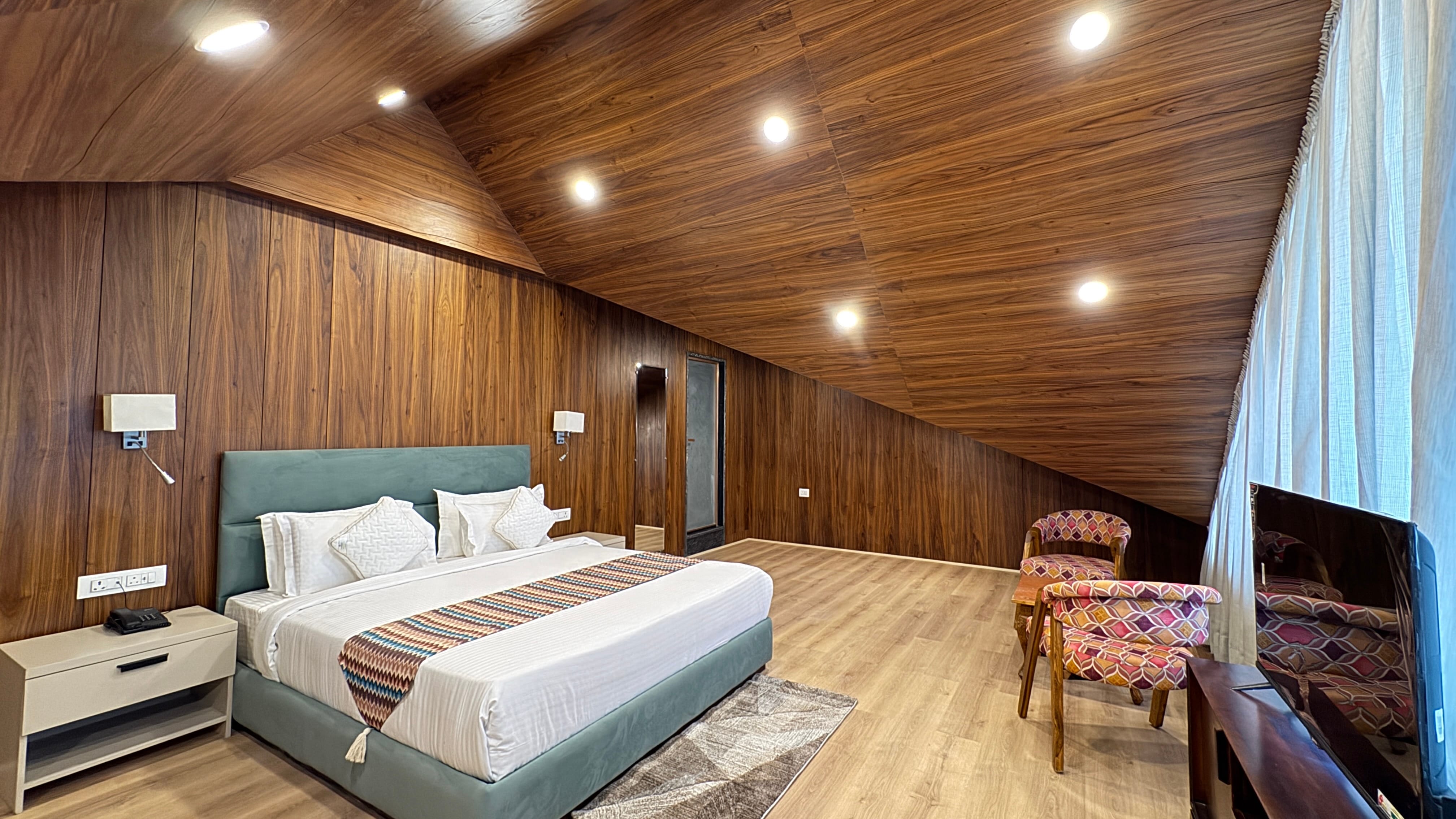 Premium attic room with wooden ceiling